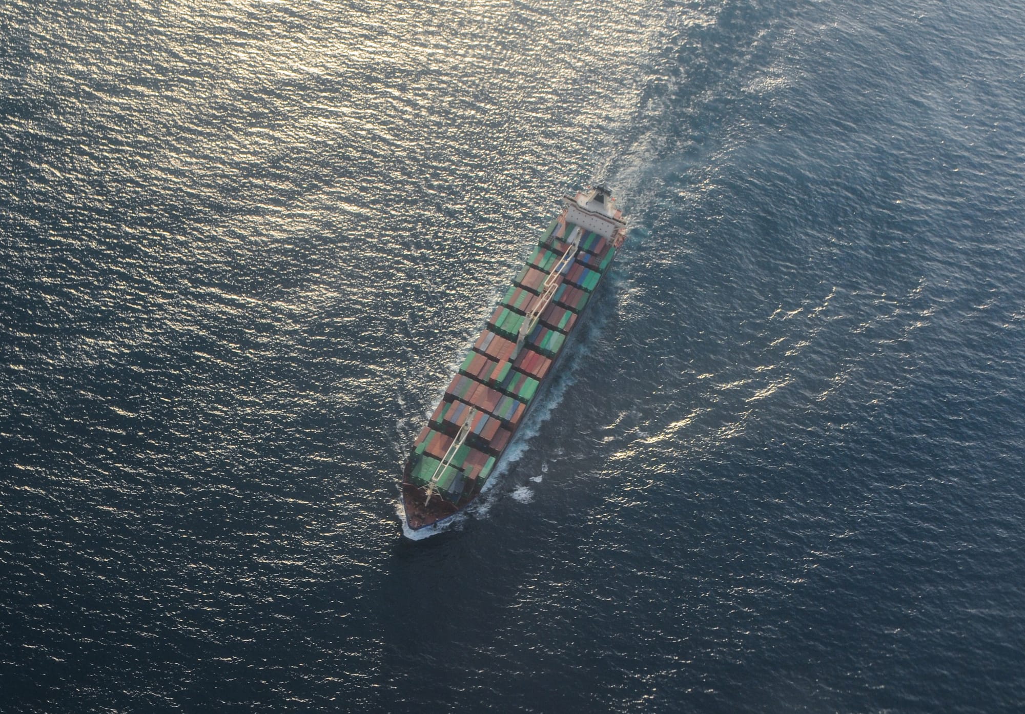Loaded container ship under way, seen from above