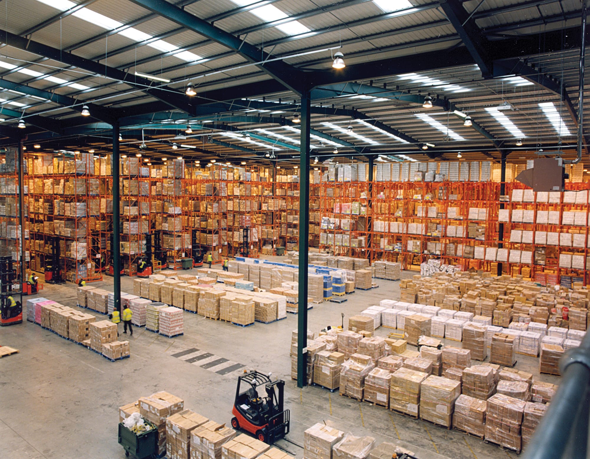 Warehouse hall with high-bay racking and palletised stock